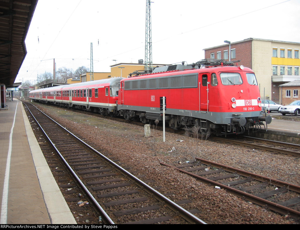 DB 110 295-3 with a train